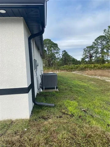 View of yard featuring central AC unit