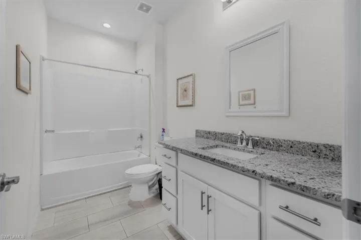 Full bath with vanity and  shower combination