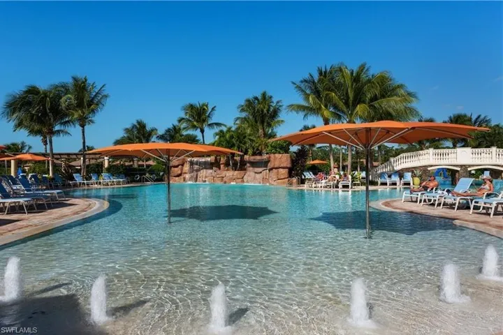 View of pool with pool water feature