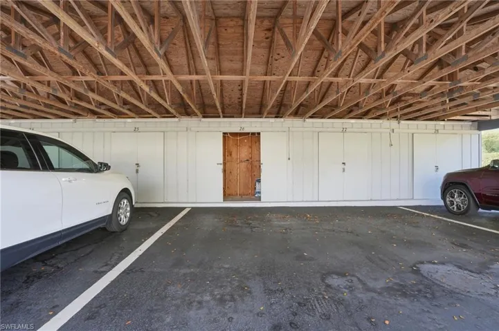 Carport with storage room for bicycles, etc
