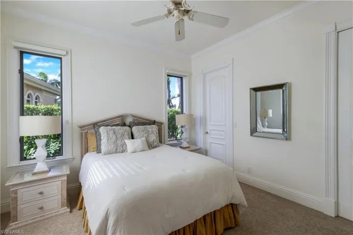 Main level guest suite w/ lg walk-in closet and full bath