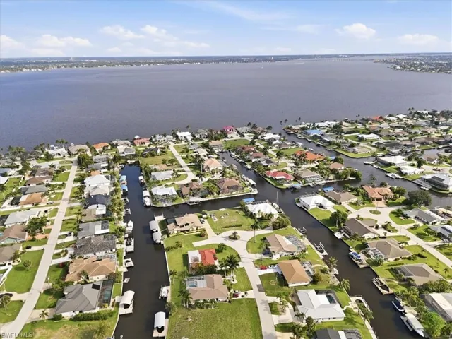 Expansive waterfront community featuring numerous canal-front homes with private boat docks