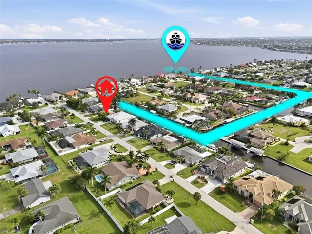 Aerial representation of a waterfront residential community featuring a network of canals