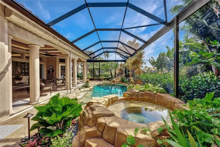 Large screened in lanai all overlooking the 2nd fairway and lake.