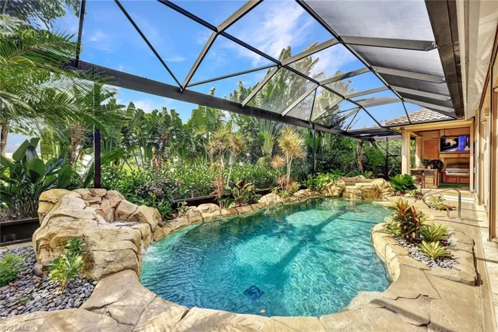 Two waterfalls adorn this tropical setting all pool equipment is new including the 'picture' screens.