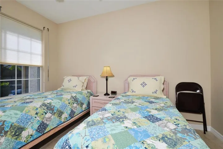 Bedroom with baseboards