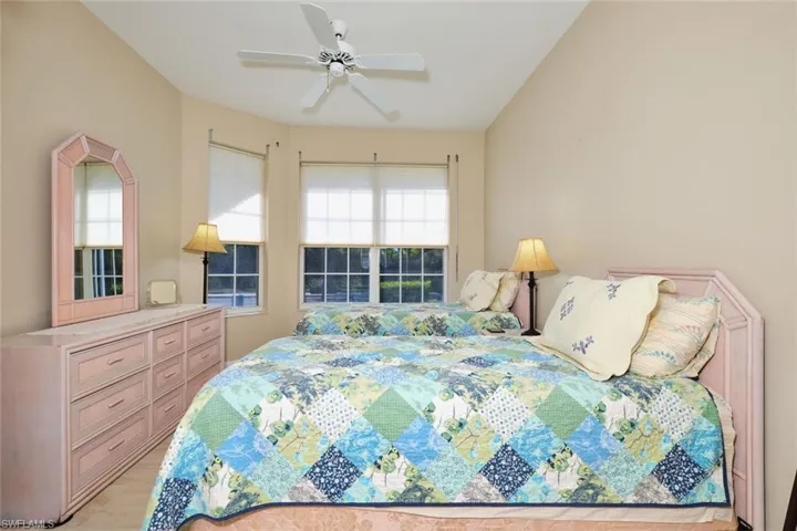 Bedroom with a ceiling fan and light wood finished floors