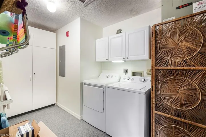 SPACIOUS LAUNDRY ROOM WITH EXTRA STORAGE