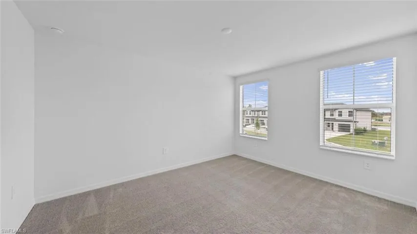 Comfortable primary suite with peaceful lake views.