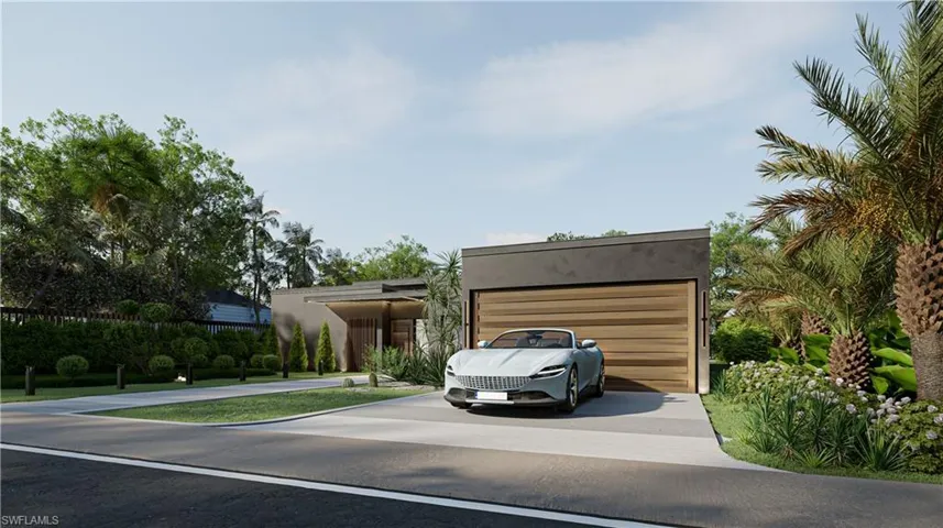 Contemporary house featuring driveway, stucco siding, and an attached garage