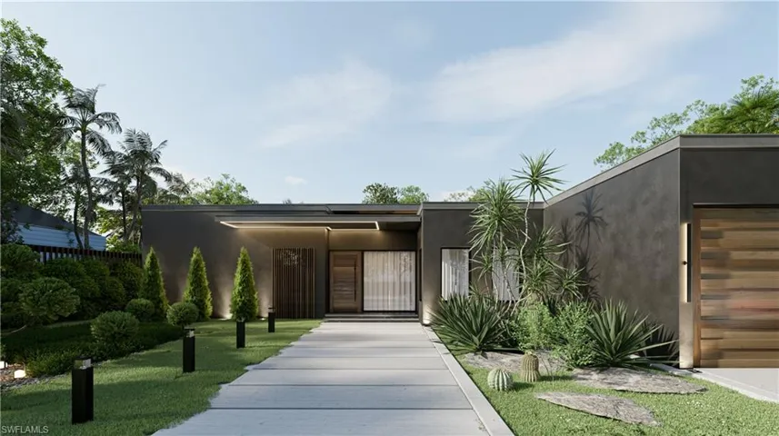 View of front of home with stucco siding, solar panels, and an attached garage