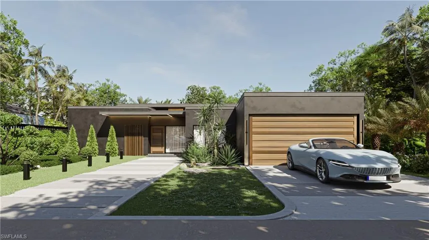 View of front of house featuring stucco siding, concrete driveway, and a garage