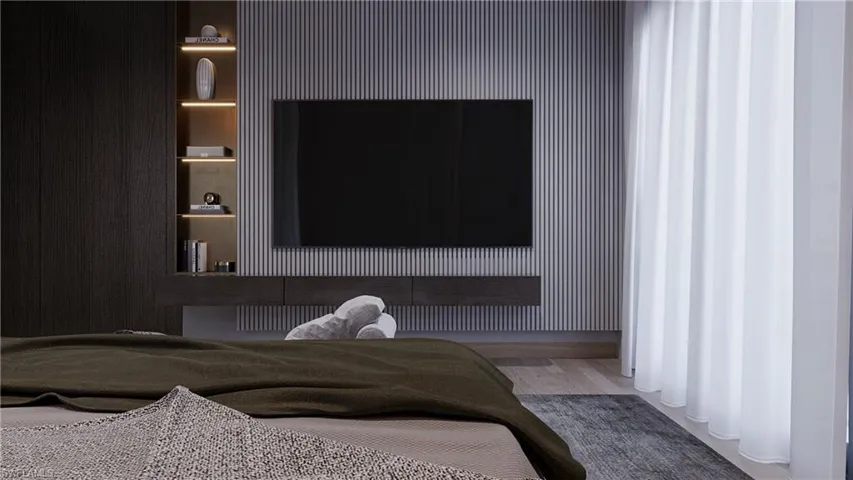 Bedroom featuring wood finished floors
