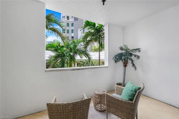 Private lanai off guest room with light tile floors