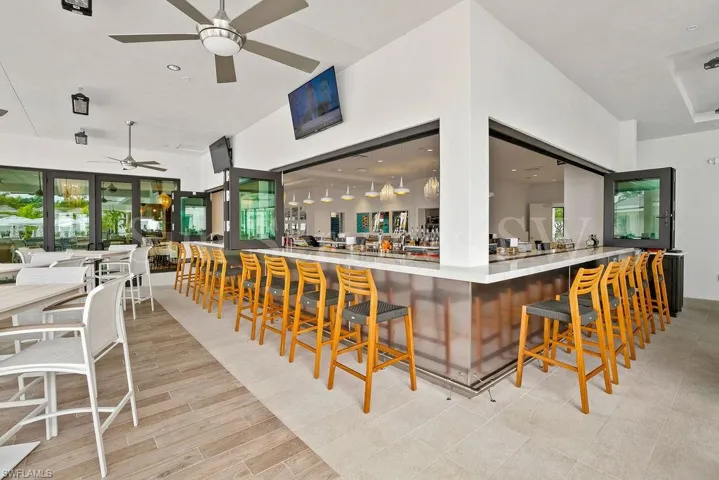 The Sand Bar featuring outdoor and indoor seating