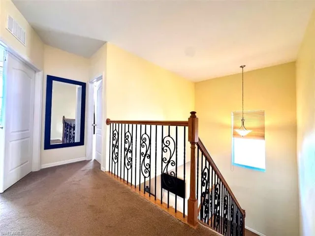 Hallway with carpet