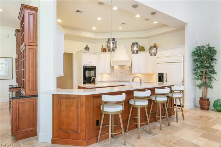 Newly renovated kitchen with quartzite countertops.