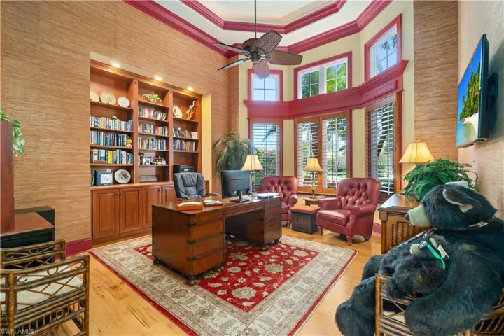 Nicely appointed bookcases and ceiling detail.