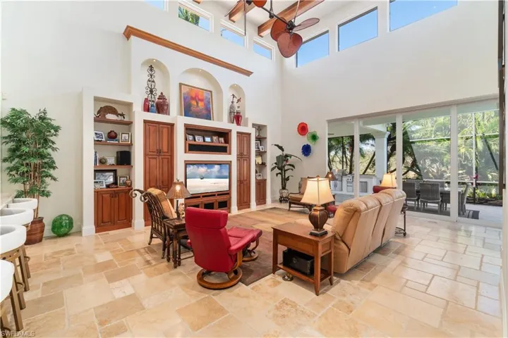 Bookcases and built in cabinets not only add to the beauty in this room but very practical as well