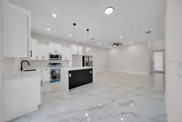 225/227  Homer S AVE, Lehigh Acres, FL 33973