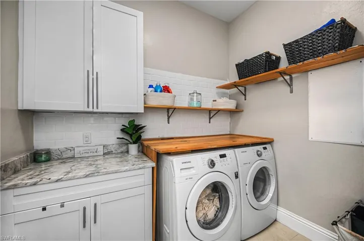 Large laundry room with lots of cabinet space