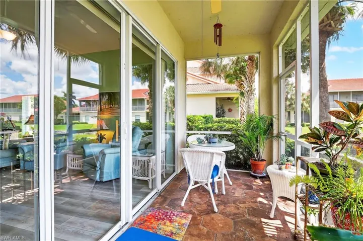 Sunroom / solarium featuring healthy amount of natural light