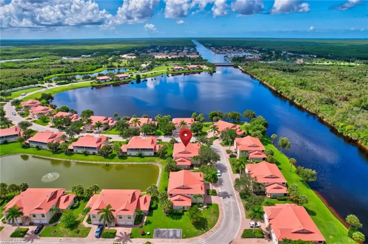 Aerial view of residential area with a large body of water