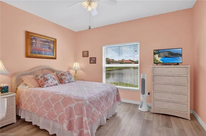 Bedroom featuring light wood finished floors and a ceiling fan