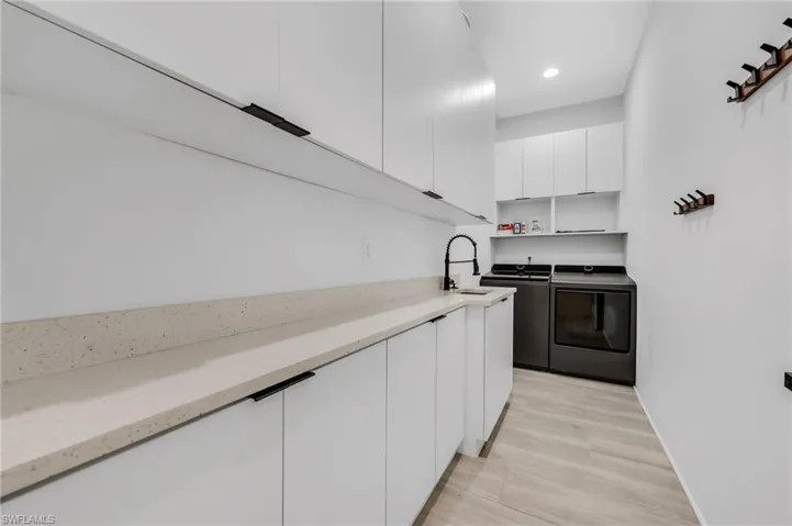 LAUNDRY ROOM WITH SINK & COUNTER