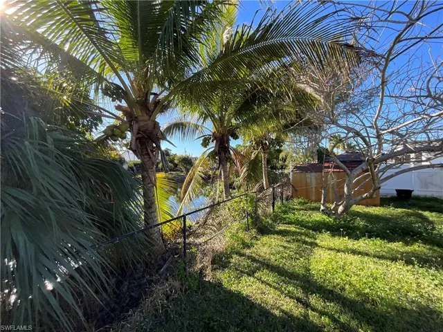 View of fenced backyard