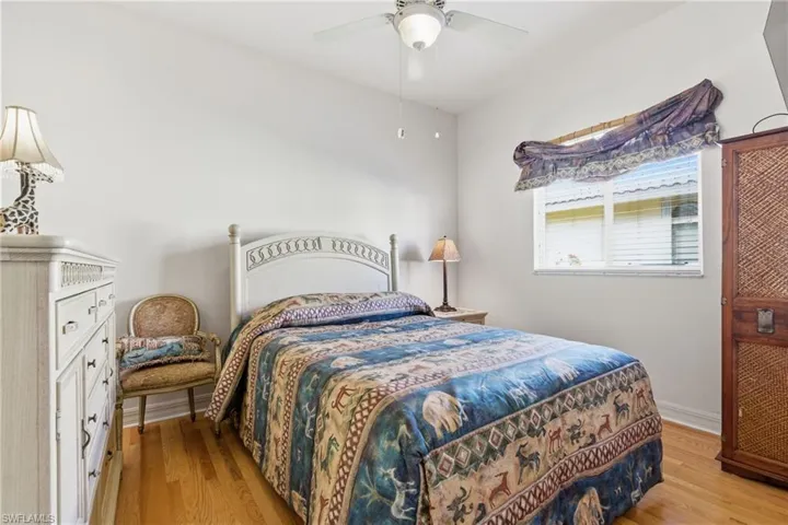 Bedroom featuring ceiling fan and light wood-style floors