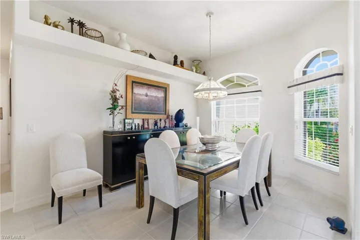 Dining area with tile patterned flooring
