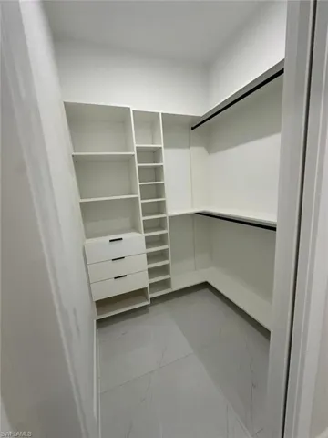 Cabinetry with integrated drawers and shelving
