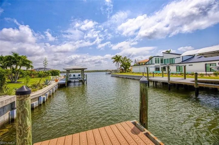 View from dock down canal, Estero Bay in the distance