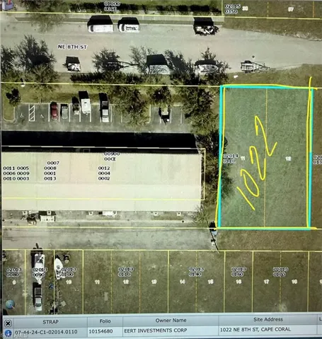 Aerial map of property and surrounding area with property boundaries highlighted
