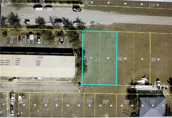Aerial map of property and surrounding area with property parcel outlined