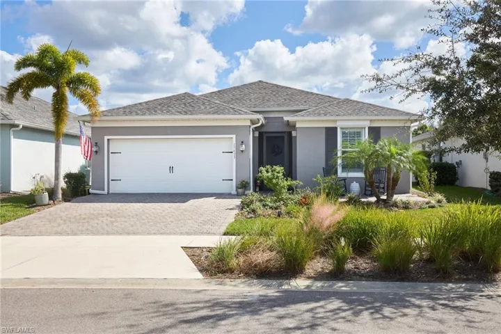 View of front of property featuring a garage