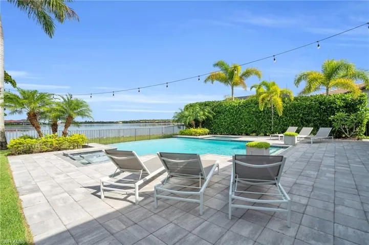 View of swimming pool showcasing view of lake