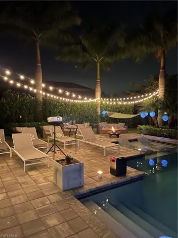 Patio terrace at night featuring a movie night