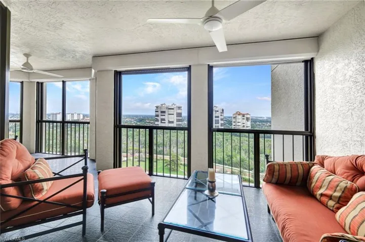 Sunroom / solarium with a city view