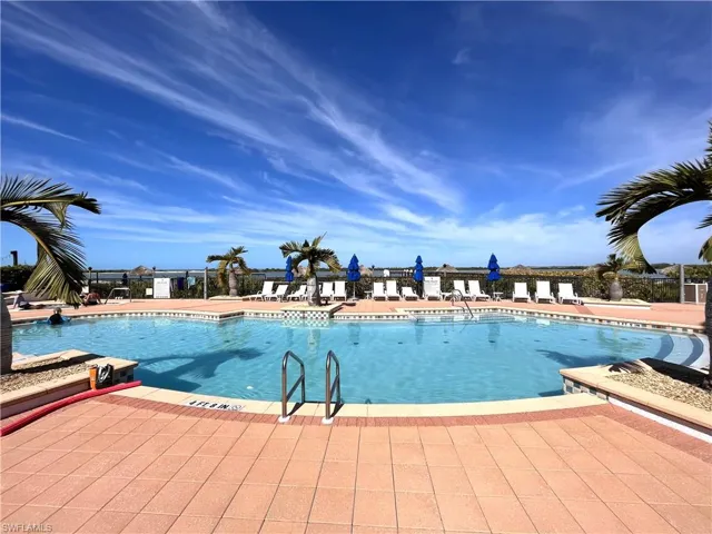 View of swimming pool with a patio area