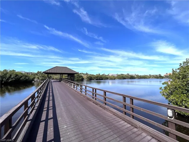 View of dock with a water view and a gazebo