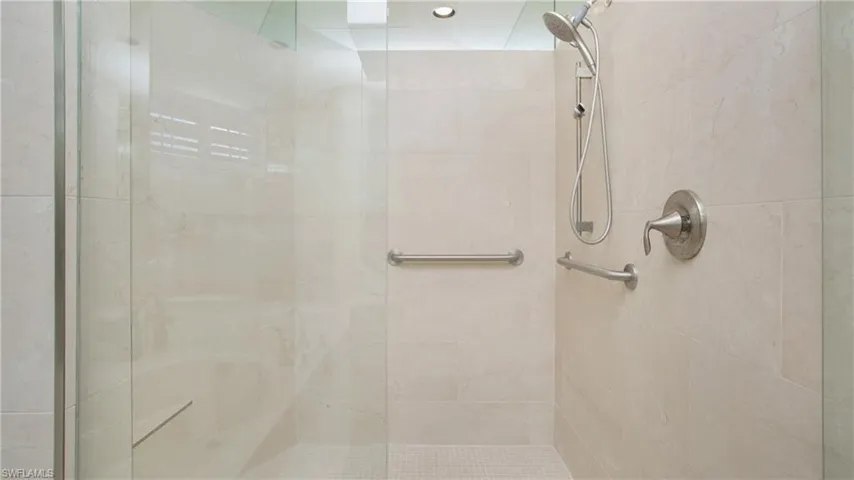 Bathroom featuring tiled shower