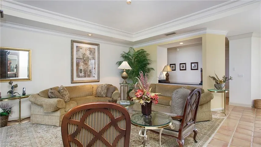 Tiled living room with ornamental molding