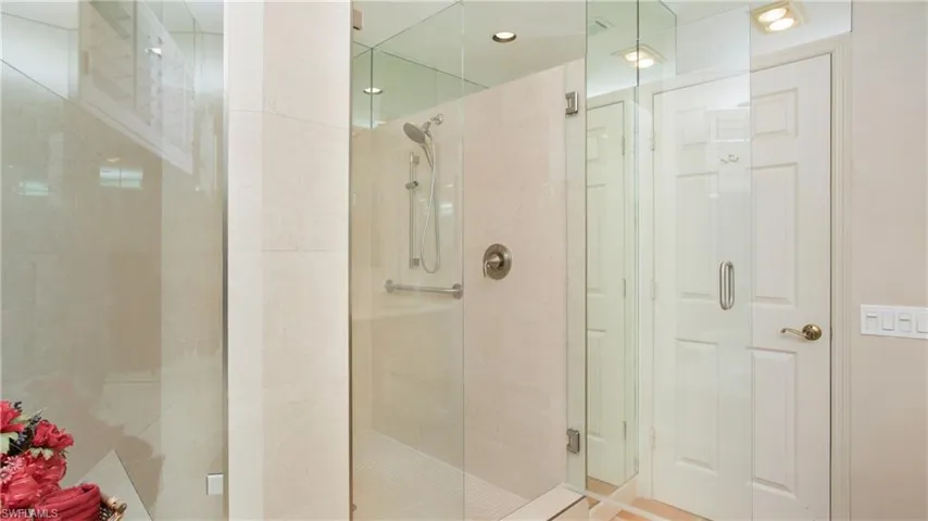 Bathroom featuring a shower with shower door