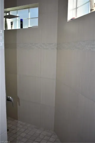 Full bathroom with a walk in shower