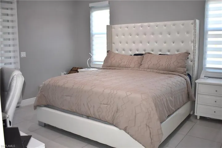Bedroom featuring light tile patterned floors