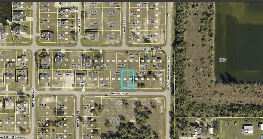 Aerial map of property and surrounding area with property parcel outlined