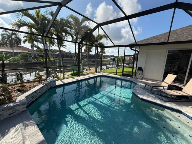 View of the Swimming Pool, Boat Dock and Canal