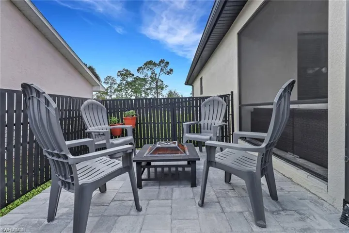 View of patio / terrace with an outdoor fire pit
